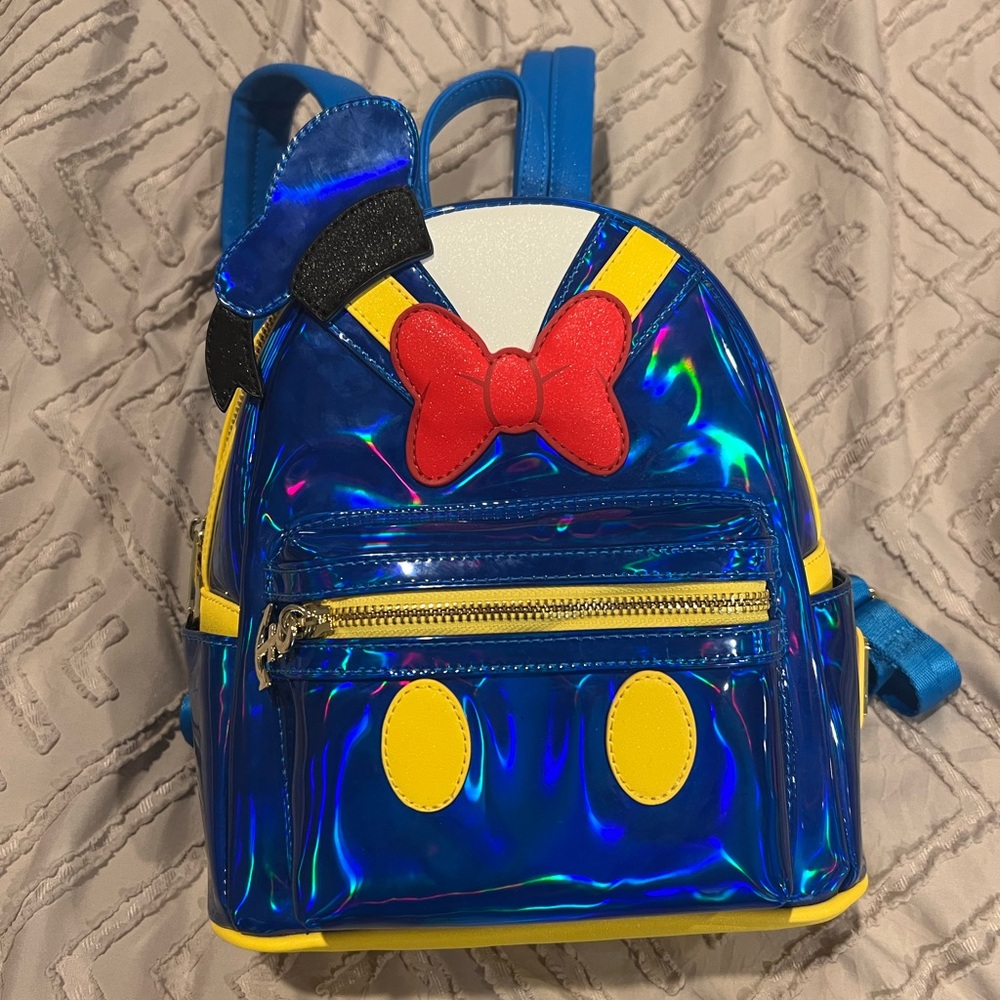 Loungefly Blue Holographic Backpack with Red Bow